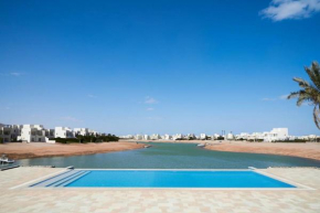 Ground floor two bedrooms in Joubal Lagoon with direct pool access and view